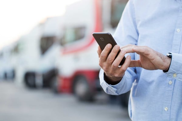 Truck driver using an app on mobile