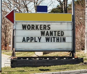 fast food sign saying workers wanted apply within_cropped