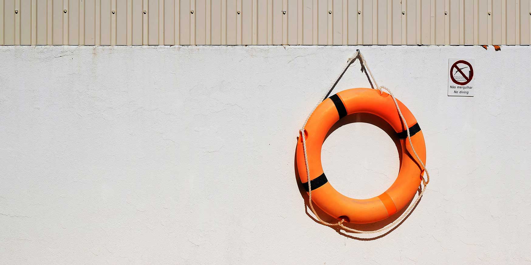 Life preserver hanging on a wall