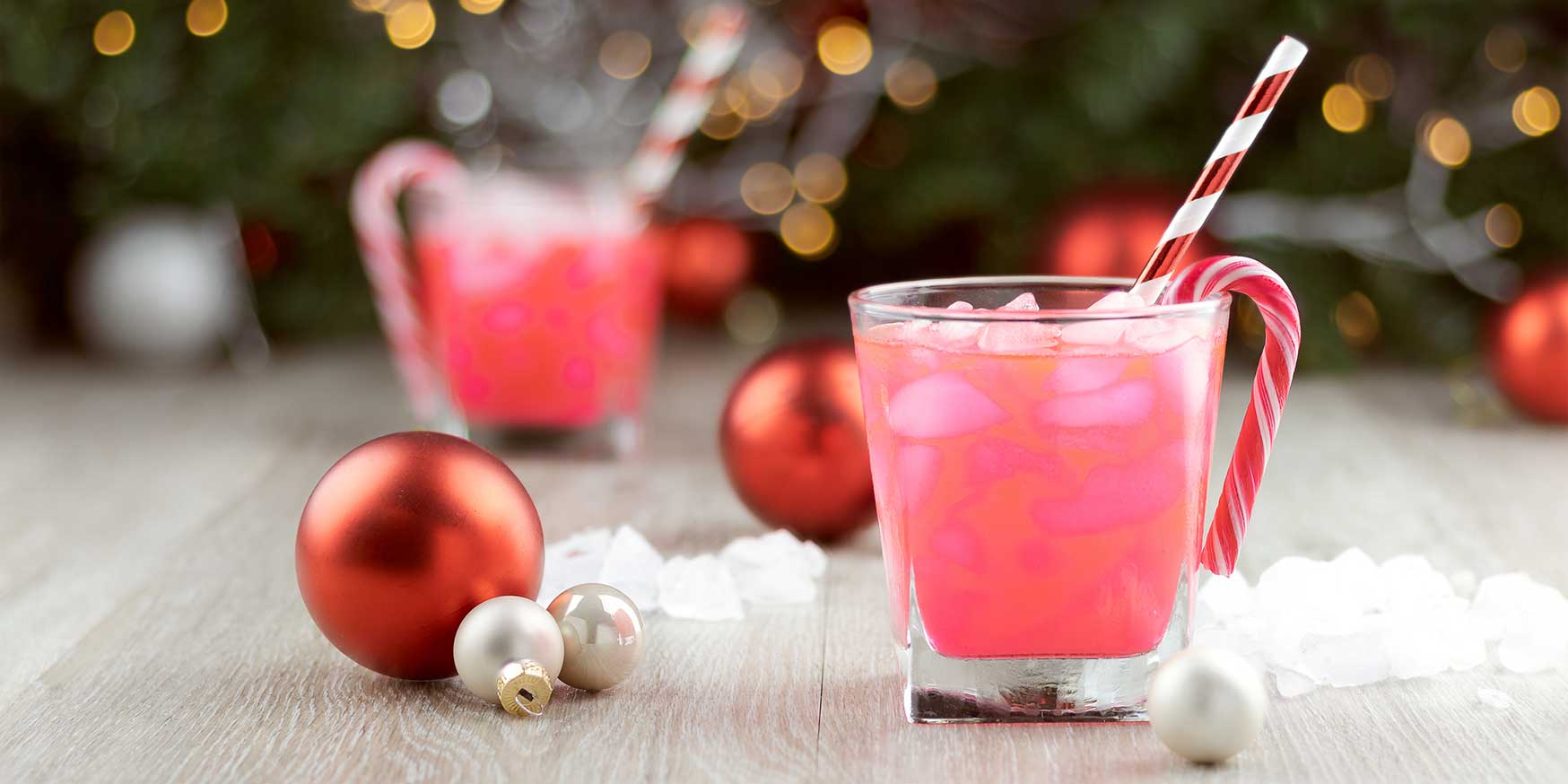 holiday office party alternative pink cocktails with candy canes at home