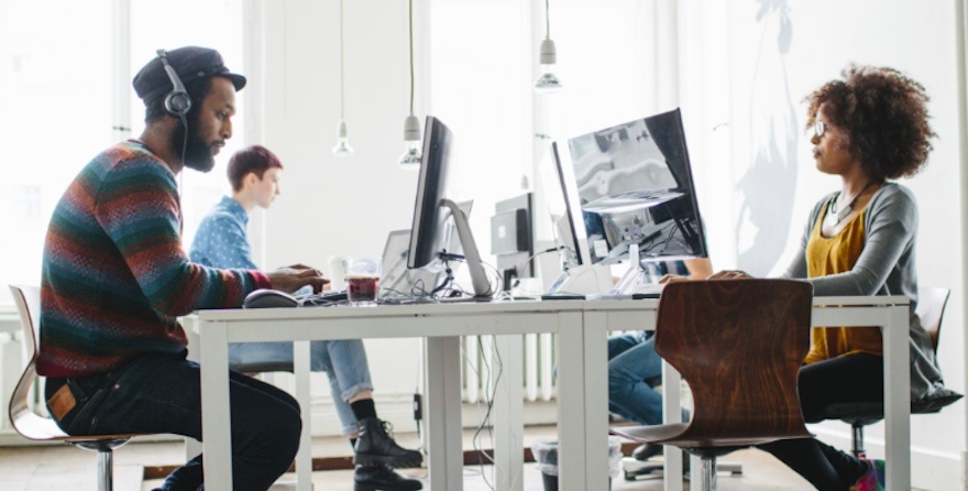 coworkers-working-at-desk