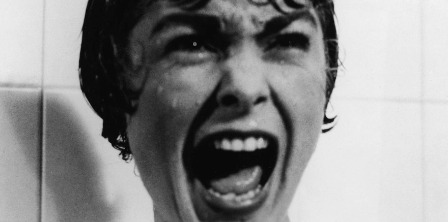 woman-screaming-in-a-scary-movie